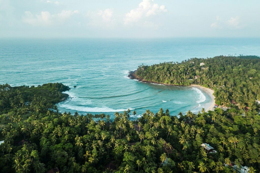 an aerial view of a tropical island and the ocean Sri Lanka