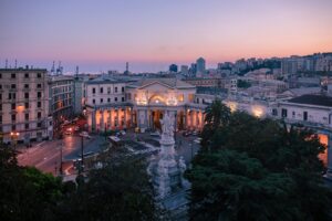 a view of a city at dusk from above